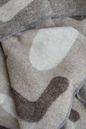 Wollen deken/knuffeldeken kiezelsteen/aarde/krijt