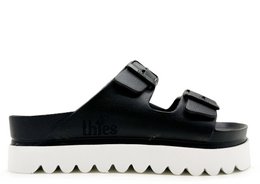 Black vegan platform sandal with adjustable straps and chunky sole.