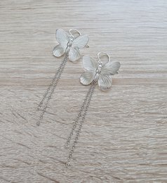 Long-length rhodium plated butterfly earrings