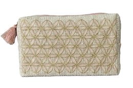 Geometric flower pattern cotton toiletry bag, pink and gold colors, rectangular shape, zipper closure.