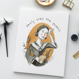 A colorful postcard featuring a smiling woman with a whimsical, artistic illustration. The text on the card reads "Emily was a Prönte".