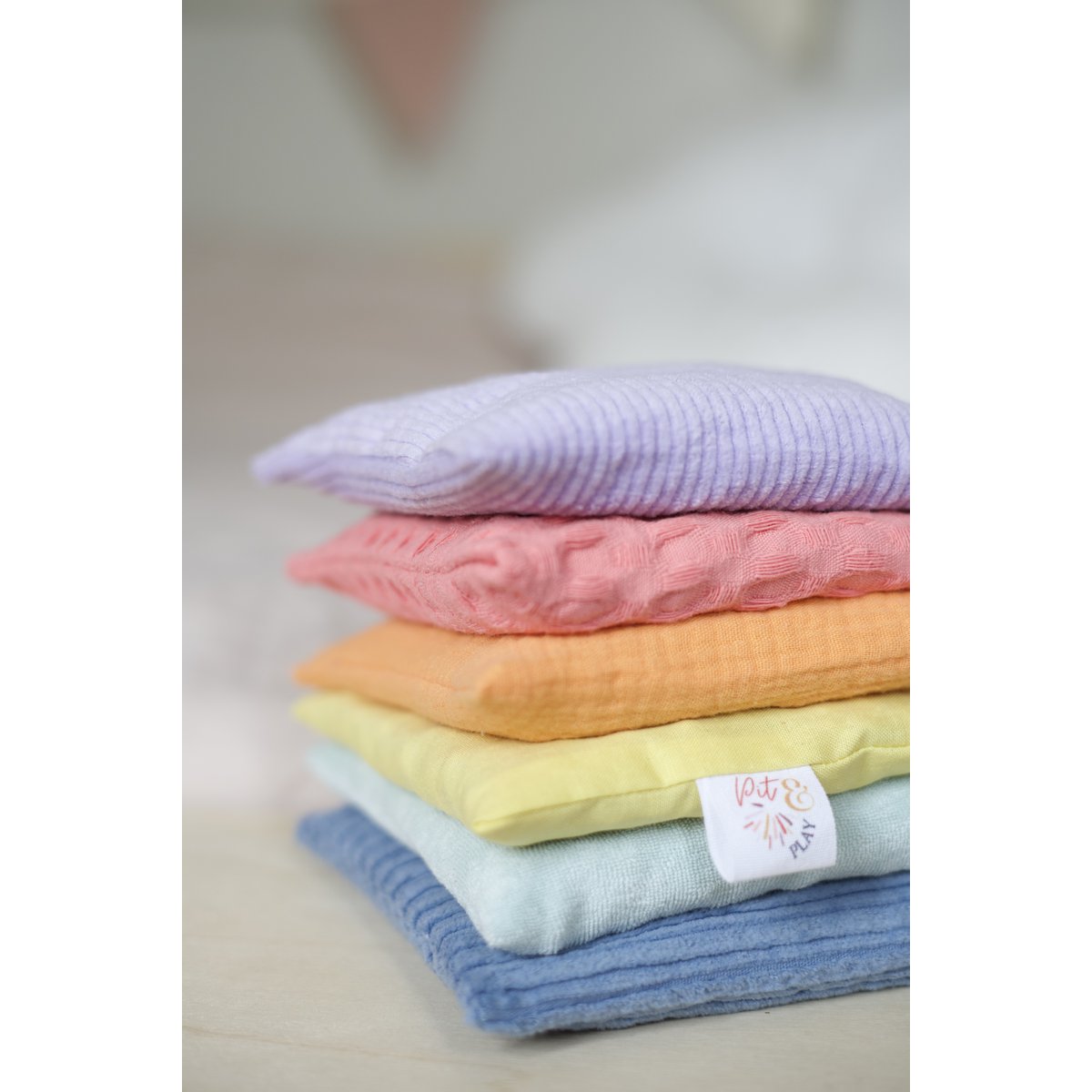 Pittenzakjes pastel, kirschkern kissen, sensory beanbag