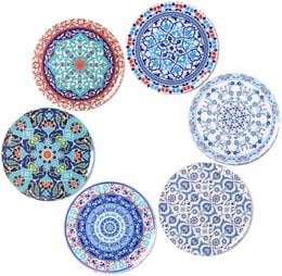 Colorful, patterned coasters with intricate designs featuring floral, geometric, and mandala-inspired motifs. The coasters appear to be made of ceramic or porcelain and would complement a variety of home decor styles.