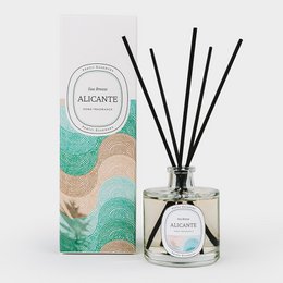 Reed diffuser with sea breeze fragrance from the Alicante Collection. Includes glass bottle with black reed sticks.