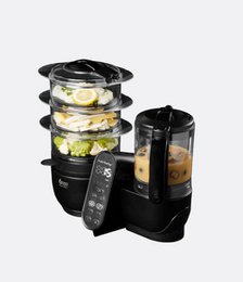  Stackable food steamer with digital controls, multiple compartments for cooking different foods simultaneously, and a compact design for efficient storage.
