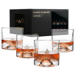 Set of 4 whiskey glasses in a gift box, made of clear glass with a unique diamond-shaped design.