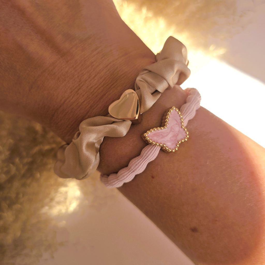 Elastique cheveux papillon rose tendre