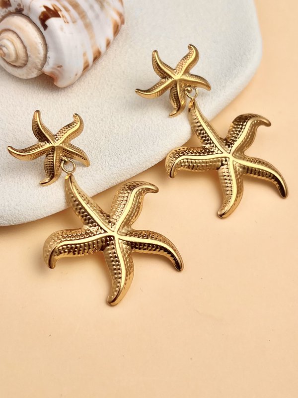 Goldene Meer mit hohem Sternohrringen