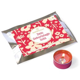 A round, red tealight candle in a decorative red and white floral pattern box. The box is labeled "Fortune's Lucky Light / Your Light / Your Birthday Light / VE 15" indicating this is a tealight candle product.