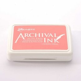 Coral-colored archival ink pad for crafting and scrapbooking, featuring a rectangular shape and the brand name "Ranger" printed on the surface.