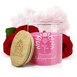 Decorative rose-scented candle with a crackling wooden wick, perfect for gifting to a loved one.