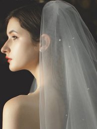 Elegante tweedelige bruidssluier met kleine parels