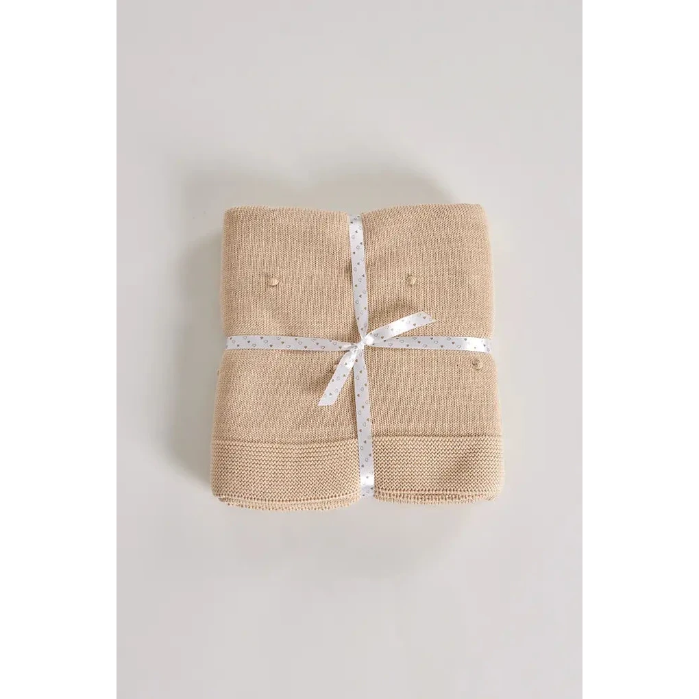 Coperta in maglia di cotone per bambini con pompon