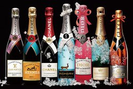 # Product Description
Assorted champagne and sparkling wine bottles collection with varied colors, labels, and designs for celebration beverages.