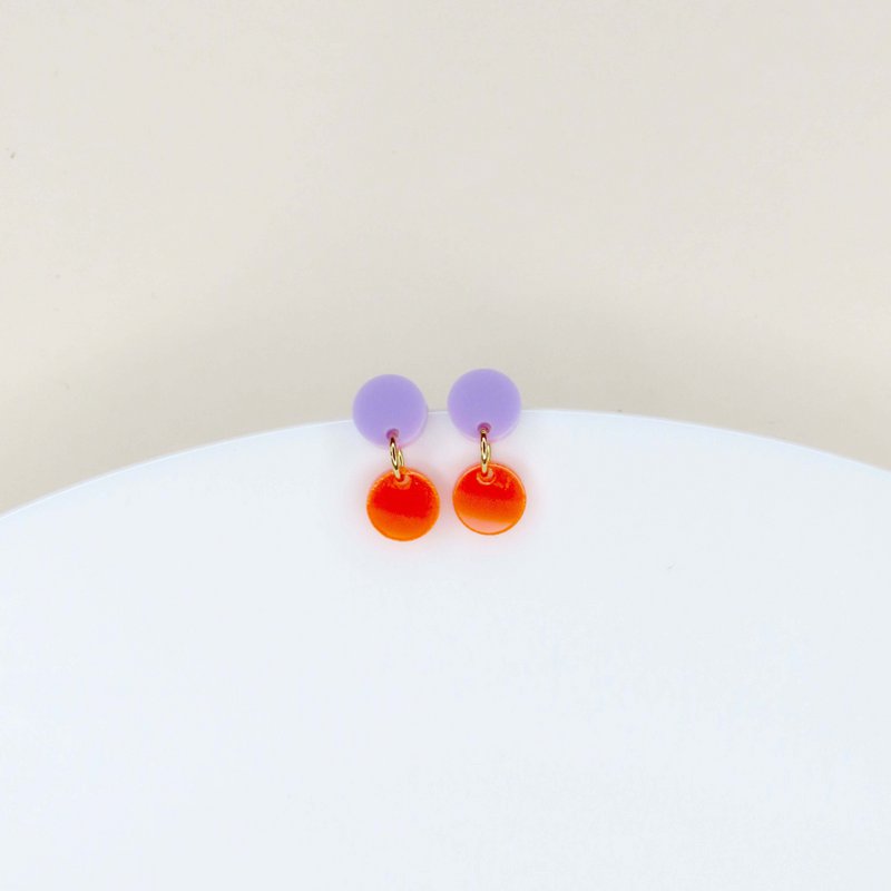 Gestippelde acryloorbellen in lila neonoranje