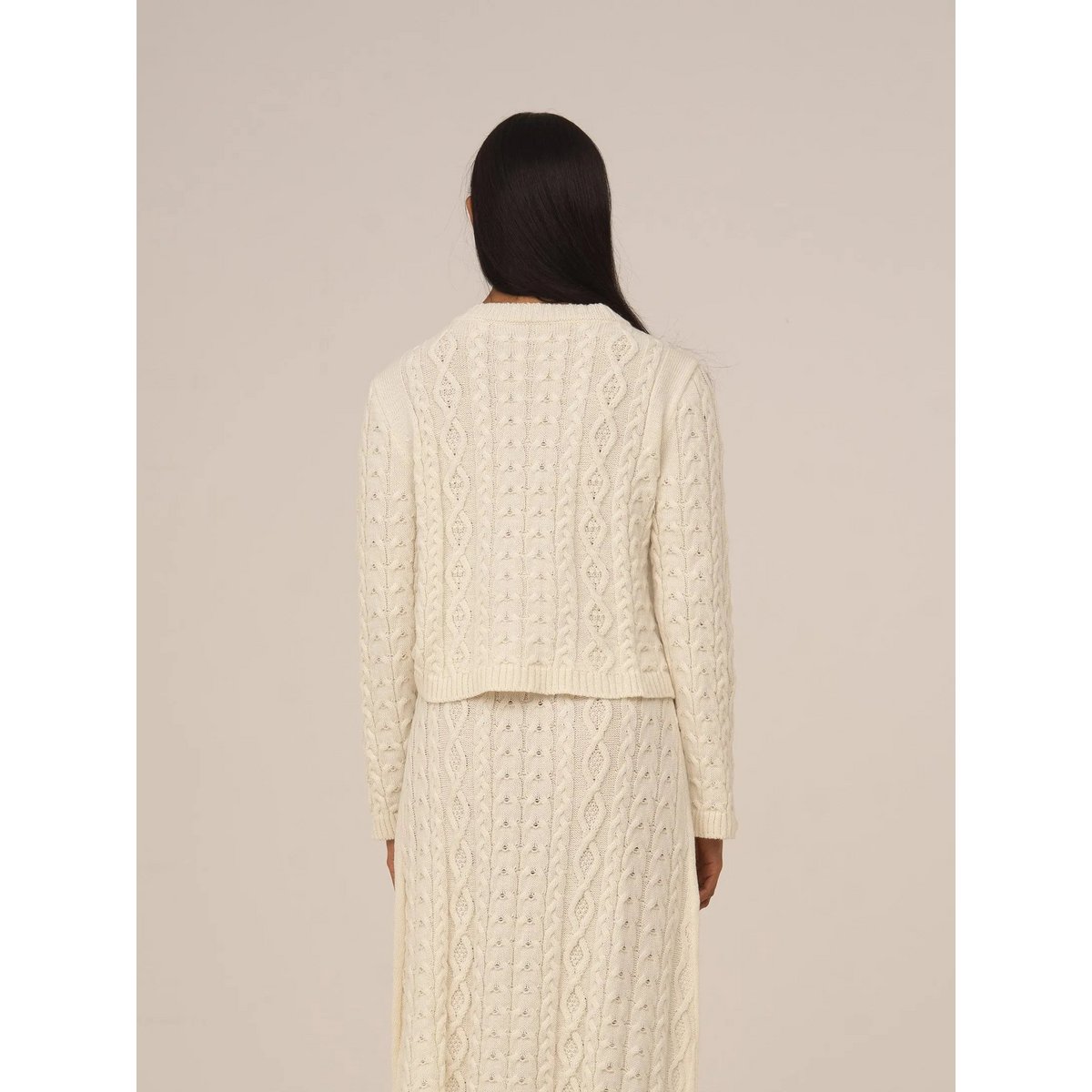 Cardigan bianco lavorato a maglia nuda