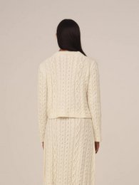 Cardigan bianco lavorato a maglia nuda