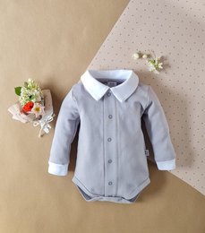 Grey long-sleeved shirt for baby boy, made of soft cotton material, with a classic collar and button-down closure. Suitable for formal or casual wear.