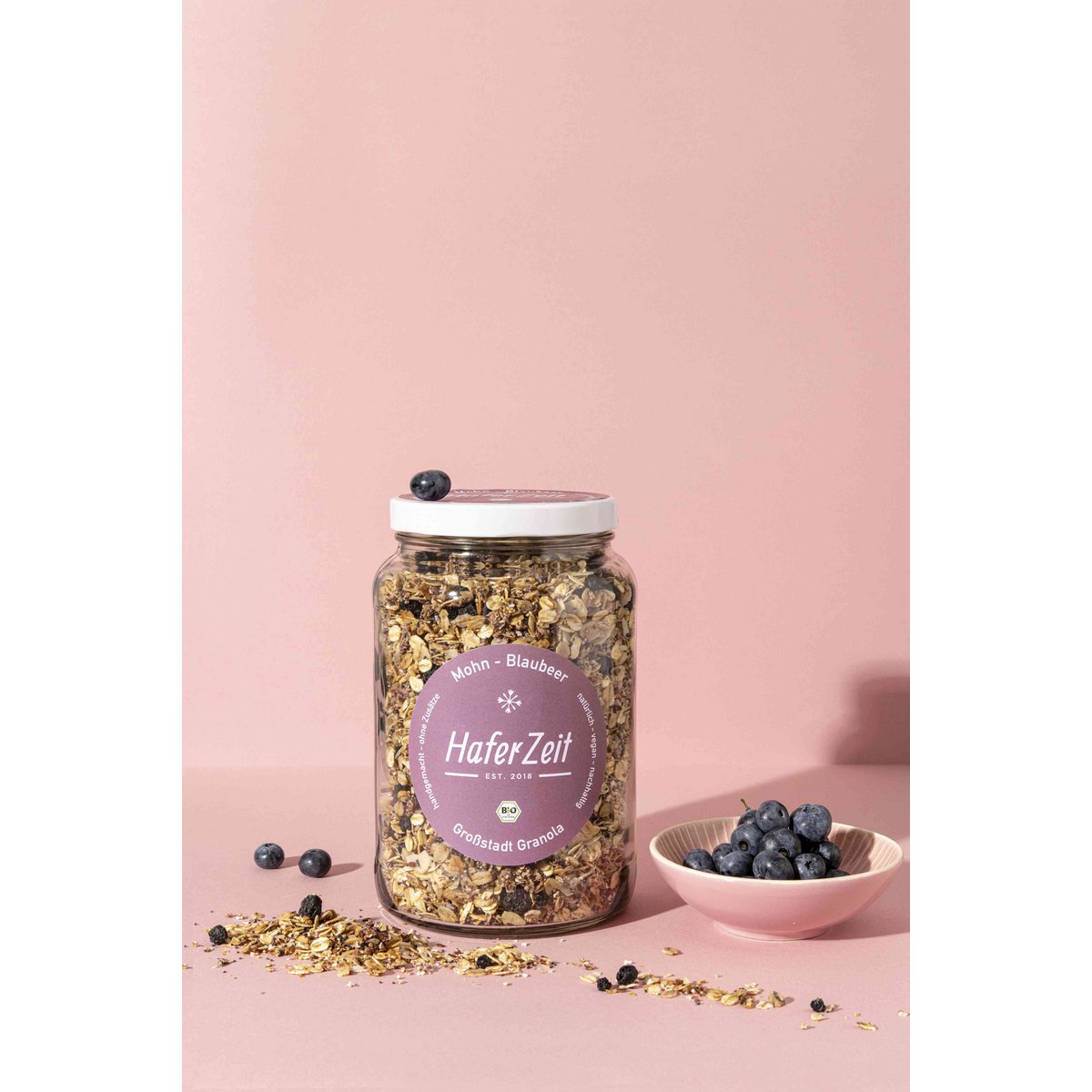 Biologische granola van maanzaad en bosbessen