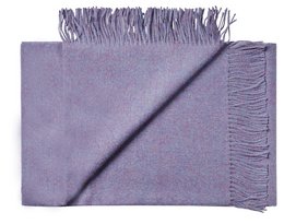 Soft, cozy throw blanket in a plain lavender color with fringed edges, made from high-quality baby alpaca blend material.