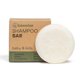 Gentle, natural shampoo bar for babies and kids. Solid, round bar with a creamy white color.