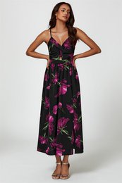  Long black maxi dress with vibrant floral print in shades of pink and purple. Sleeveless design with v-neckline. Suitable for casual or formal occasions.