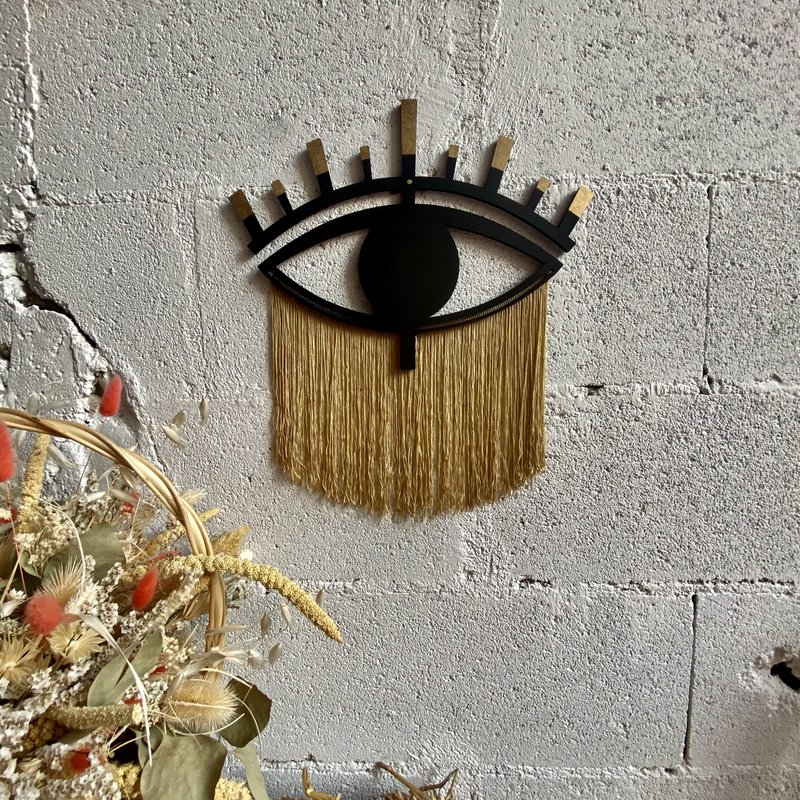 Occhio decorativo in legno e filo di cotone