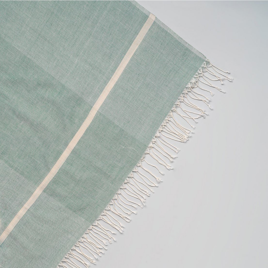 Soft handwoven cotton scarf green with small white stripe on each border
