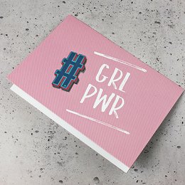 Greeting card with pink background and hashtag sticker-patch design. Includes text "GRL PWR" in navy blue.