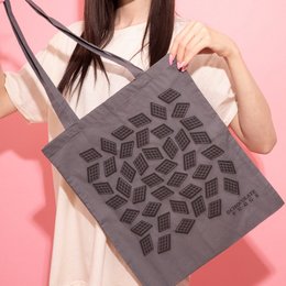Gray and white cotton tote bag with a geometric pattern design, suitable for shopping or everyday use.