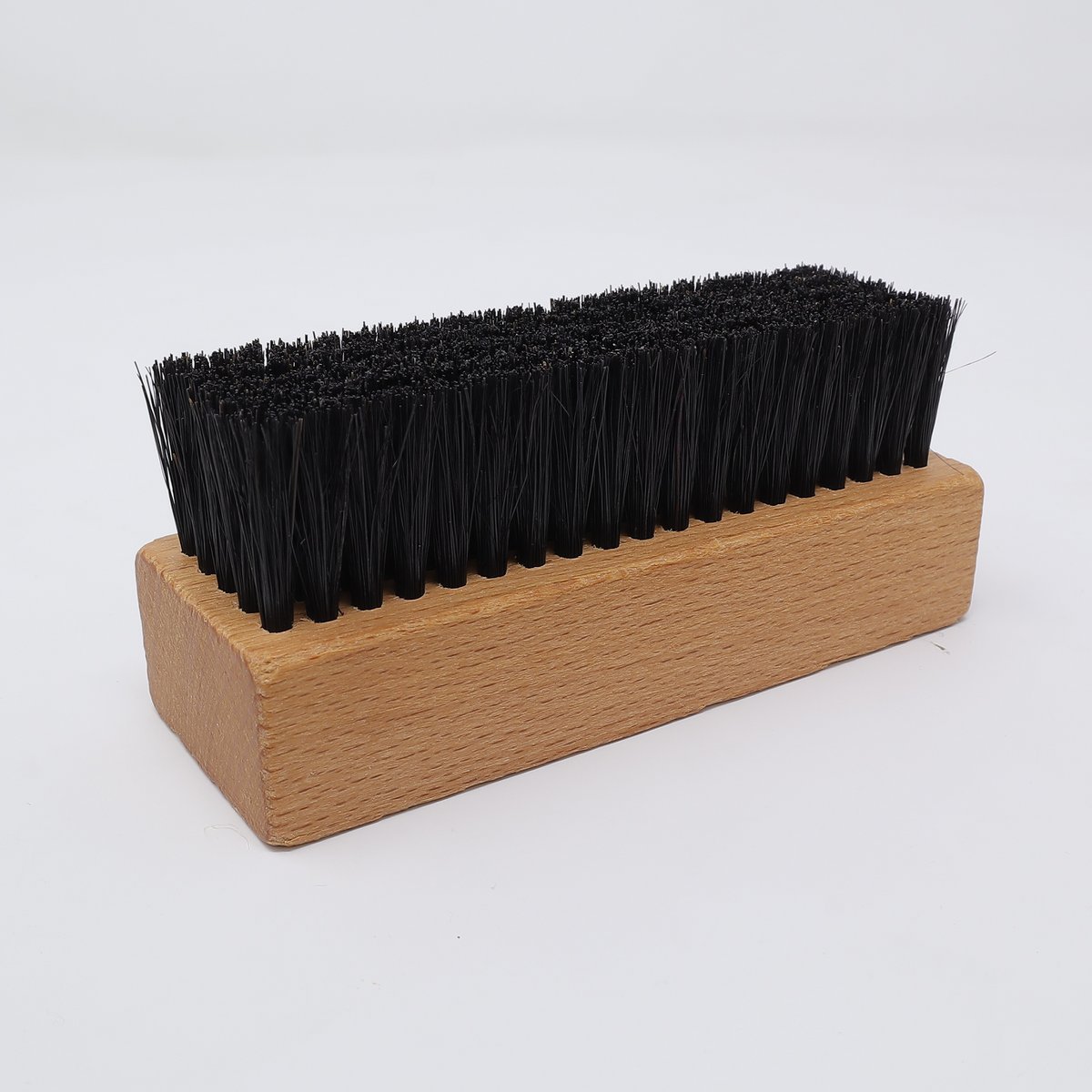 Sneaker brush with dark bristles