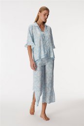  Light blue women's short sleeve shirt and pants pajama set with floral print pattern.