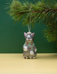 Grey cat figurine wearing knitted scarf, ceramic ornament, cute animal souvenir decoration