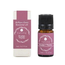 Thyme essential oil in a glass bottle with a pink and white label. The essential oil is for aromatherapy and natural wellness purposes.