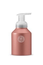 Aluminum bottle with foam pump in terra color, hand soap product.