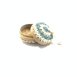 Bambu box with beads and cowrie shells