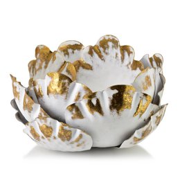 White ceramic candle holder with gold leaf accents, lotus flower petal design, decorative home decor.