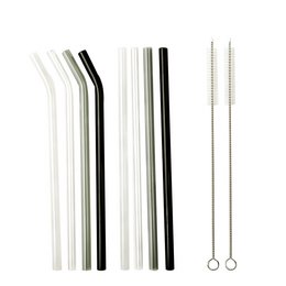 Reusable glass drinking straw set in mixed colors, including black, white, and clear straws, as well as a cleaning brush.