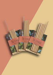 Reusable paper straws in jungle-themed packaging, available in regular and small sizes.