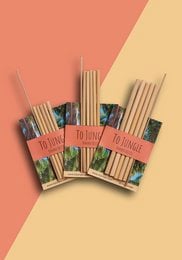 Reusable paper straws in jungle-themed packaging, available in regular and small sizes.