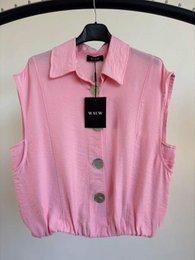 Pink sleeveless button-up blouse, collared shirt, casual lightweight fabric, available multiple colors.