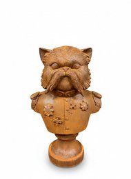 Cast iron garden sculpture of a cat with a whimsical, detailed design featuring a round, plump body and expressive facial features.