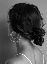 Gold-vermeil hoop earrings with a medium and large size option.