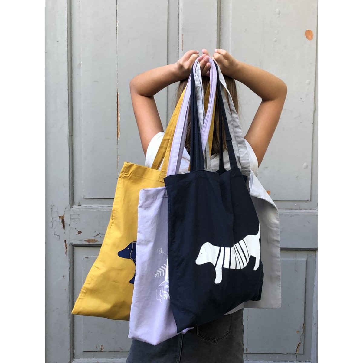 hand-printed fabric bag with green dachshund motif