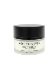 Universal cream in a round white jar with black lid. Cream for reducing stress and tension.