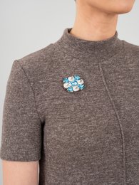 Broche Vega