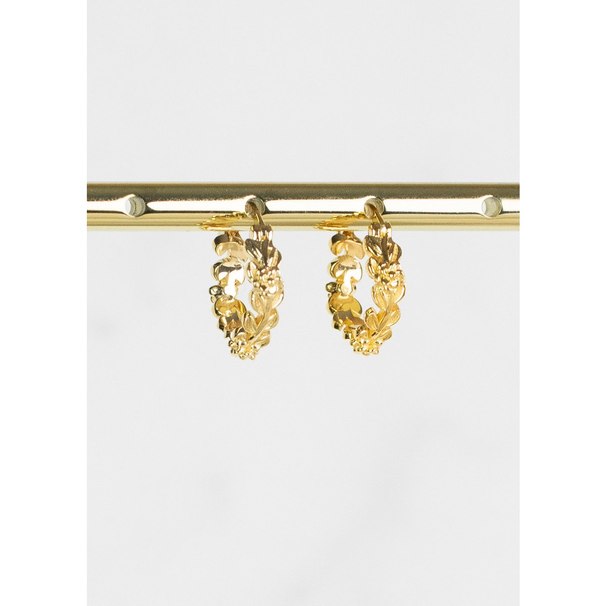 Arete flor chapado en oro 14k