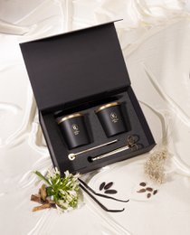  Black cylindrical scented candles, luxury gift set, vanilla fragrance, gold accents, minimalist design, home ambiance.