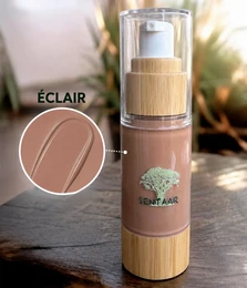 Liquid mineral foundation, beige and brown bottle, wooden bamboo pump dispenser, natural SPF protection