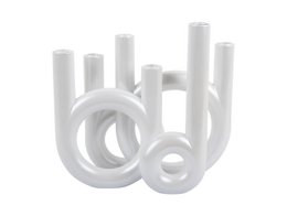 Large white candle holder rings made of ceramic material with a modern, abstract design.